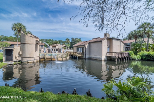 dock area with a water view