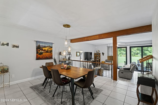 dining area with light tile patterned flooring