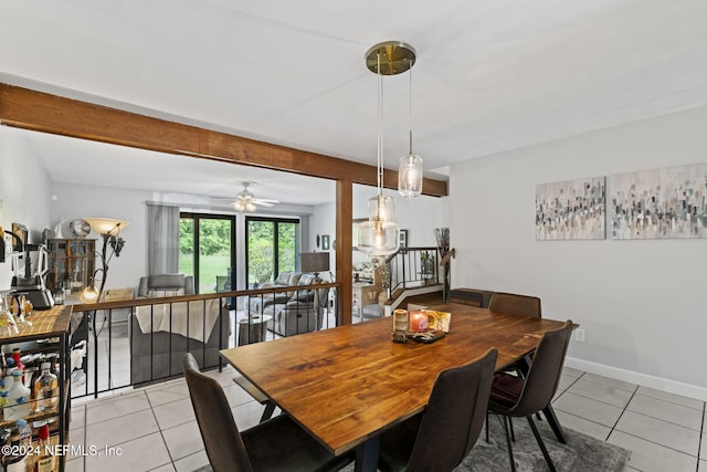 dining room featuring ceiling fan and light tile patterned flooring