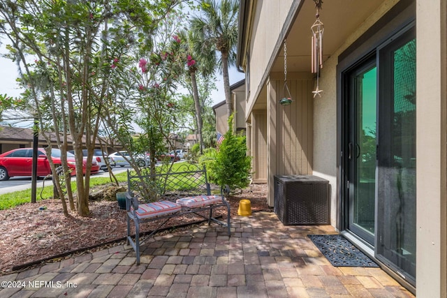 view of patio featuring central air condition unit