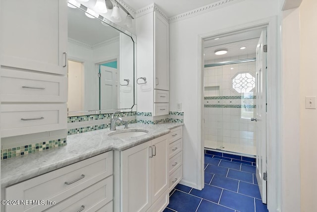 bathroom with tile patterned floors, vanity, walk in shower, and tasteful backsplash