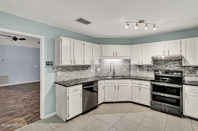 kitchen with white cabinets, appliances with stainless steel finishes, ceiling fan, and sink