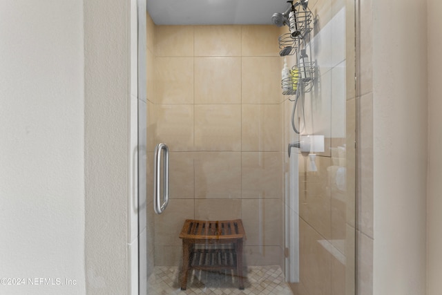 bathroom with an enclosed shower