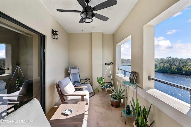 balcony featuring a water view