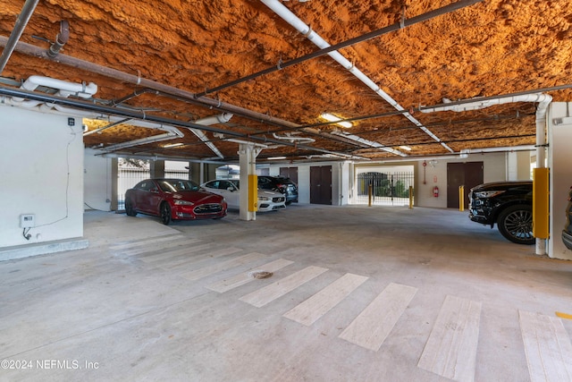 garage featuring a carport