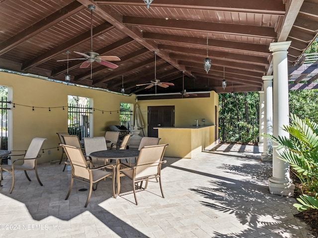 view of patio featuring ceiling fan