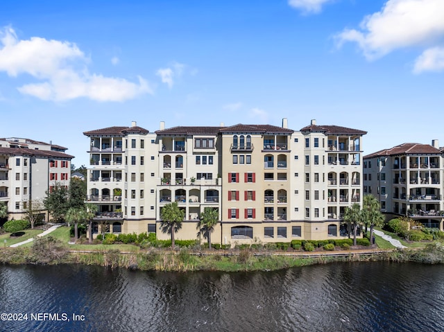 view of property with a water view