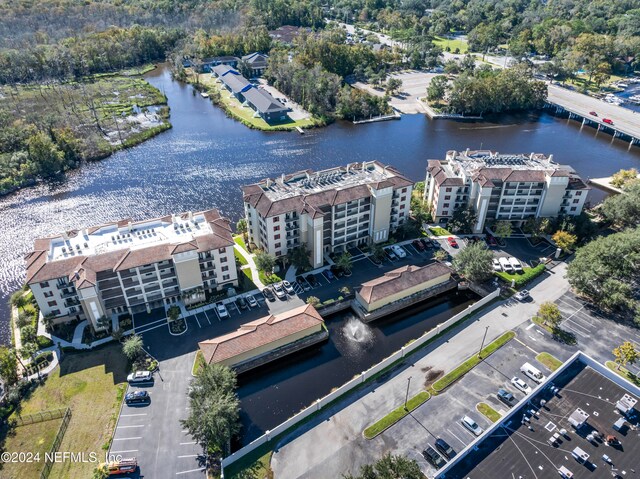 bird's eye view with a water view