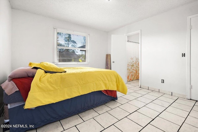 bedroom with a textured ceiling