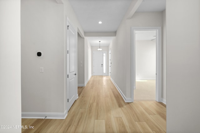 corridor featuring light wood-type flooring