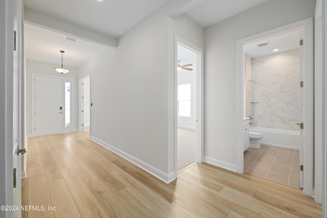 corridor featuring light wood-type flooring