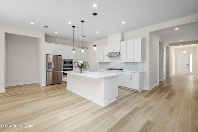 kitchen featuring a center island with sink, light wood-type flooring, white cabinetry, and stainless steel appliances