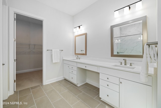 bathroom featuring tile patterned floors and vanity