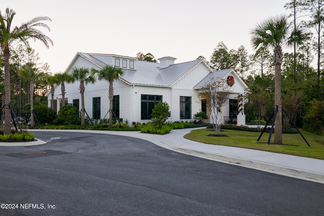 view of front of home with a front lawn