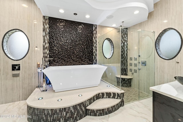 bathroom featuring vanity and a tile shower