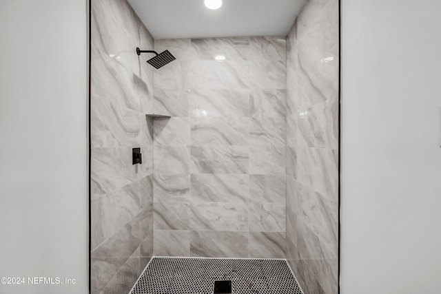 room details with a tile shower