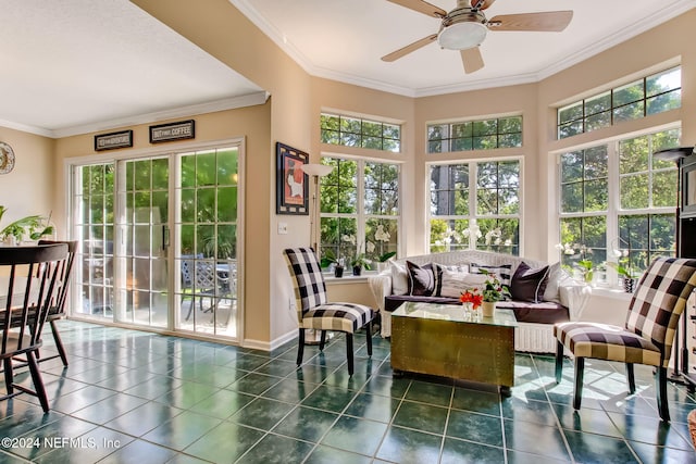 sunroom with ceiling fan