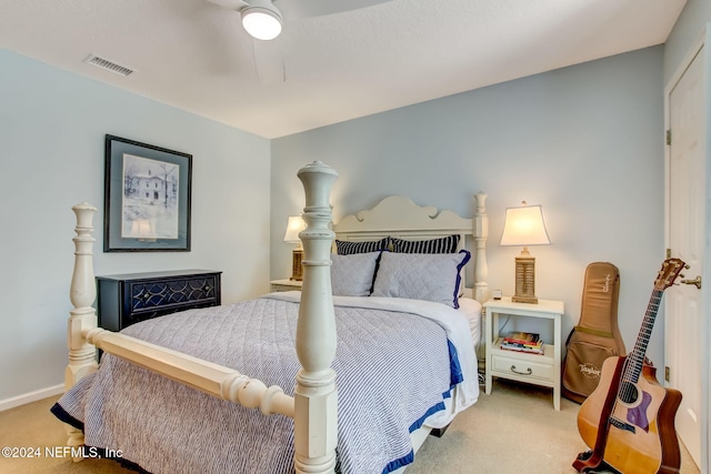 bedroom with ceiling fan and carpet floors