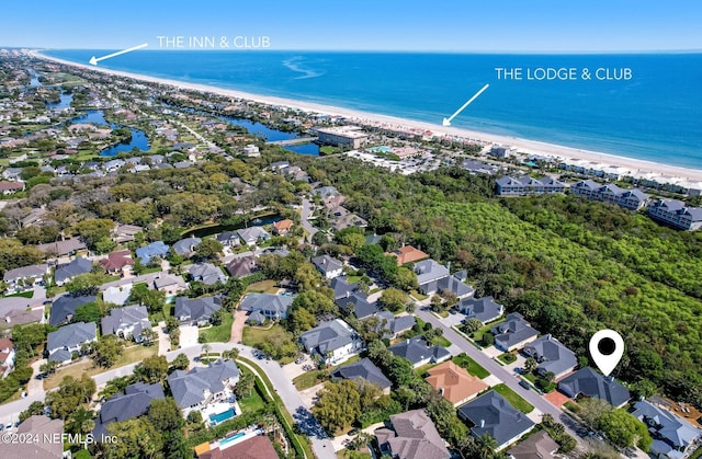 aerial view with a beach view and a water view