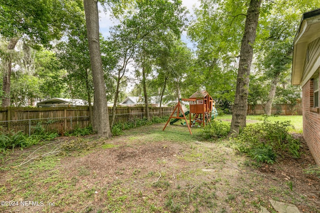 view of yard featuring a playground