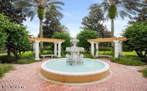 view of home's community featuring a pergola