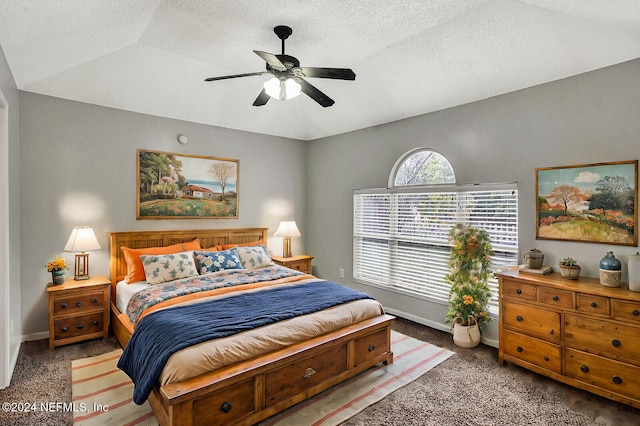 carpeted bedroom featuring a textured ceiling, ceiling fan, and lofted ceiling