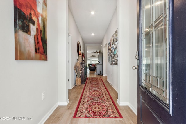 hall featuring light hardwood / wood-style flooring