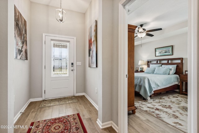 entryway featuring ceiling fan and light hardwood / wood-style floors