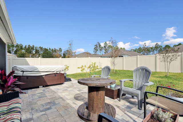 view of patio / terrace featuring a hot tub