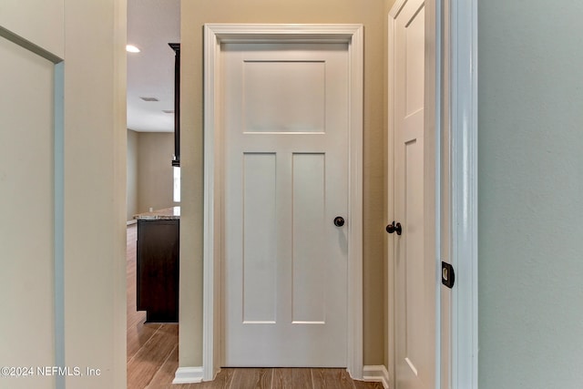 corridor featuring light hardwood / wood-style flooring