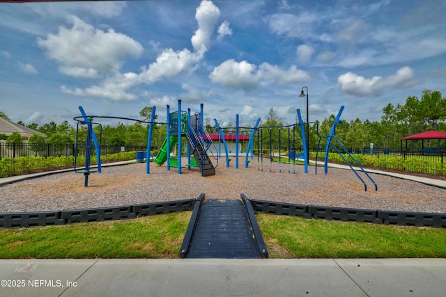 community playground featuring fence