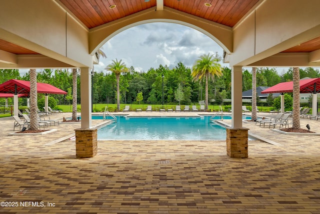 pool with a patio