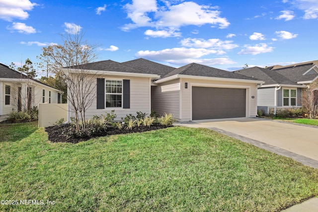 view of front of house featuring a garage, concrete driveway, roof with shingles, and a front yard