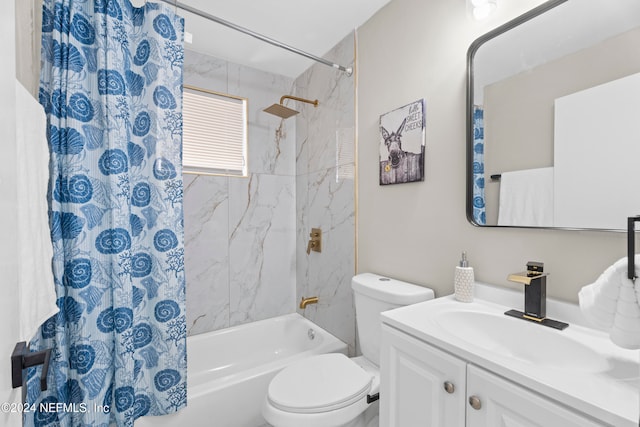 full bathroom featuring shower / bathtub combination with curtain, vanity, and toilet