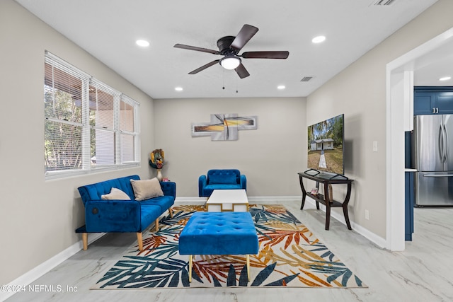 living room with ceiling fan