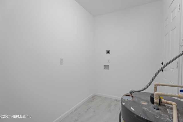 washroom with hookup for an electric dryer and water heater