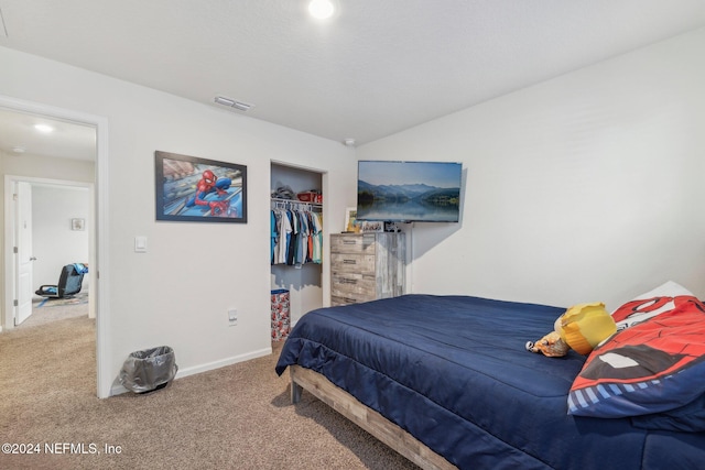 bedroom featuring a closet and carpet floors