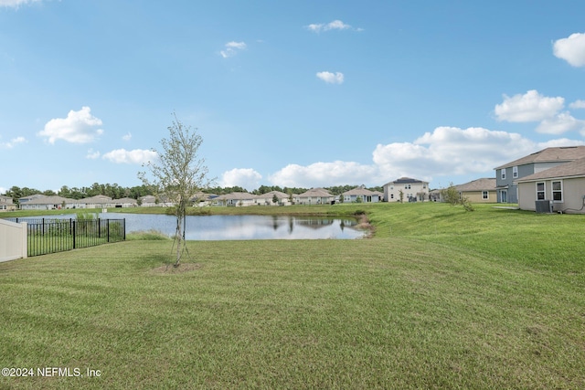 view of yard with a water view