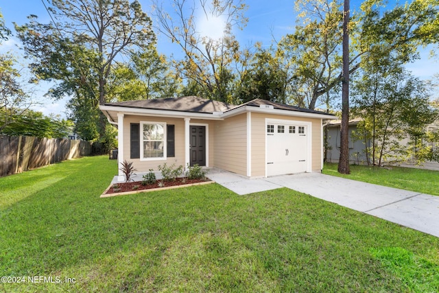 ranch-style house featuring a garage and a front lawn