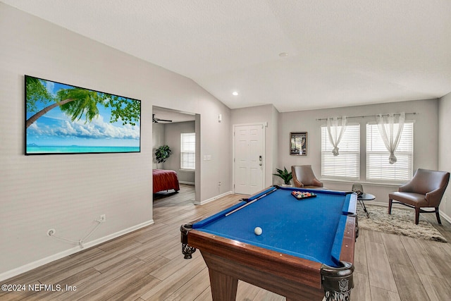 game room with hardwood / wood-style floors, billiards, lofted ceiling, and a wealth of natural light