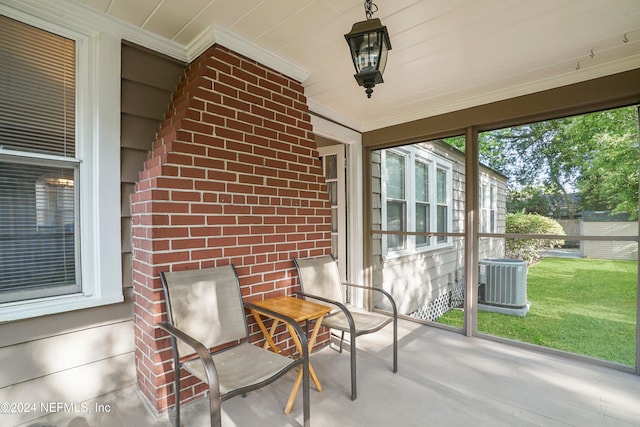 sunroom / solarium featuring wooden ceiling