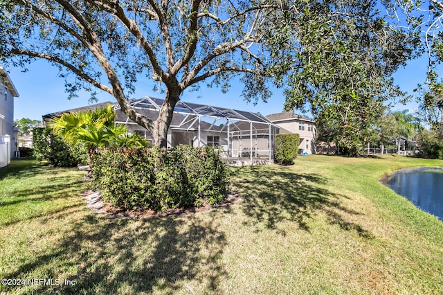 view of yard with a lanai