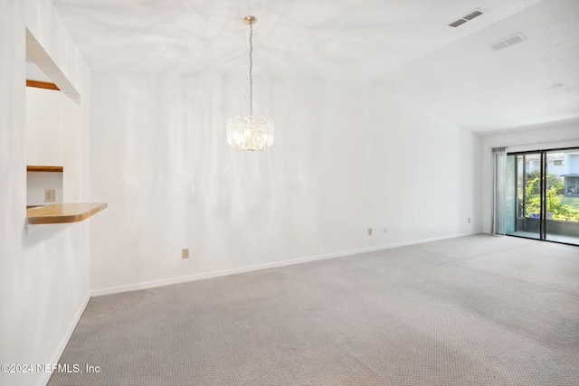 unfurnished room with carpet, lofted ceiling, and a chandelier