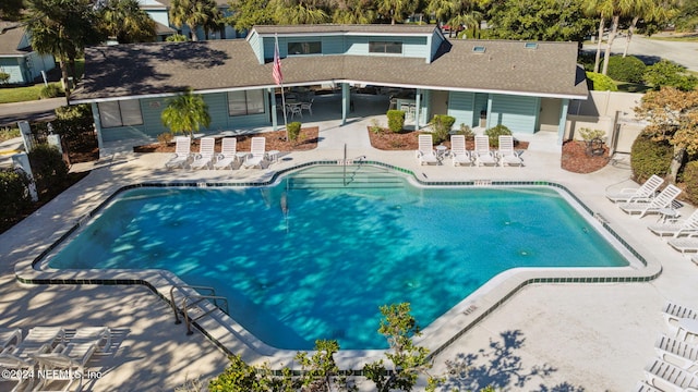 view of swimming pool with a patio