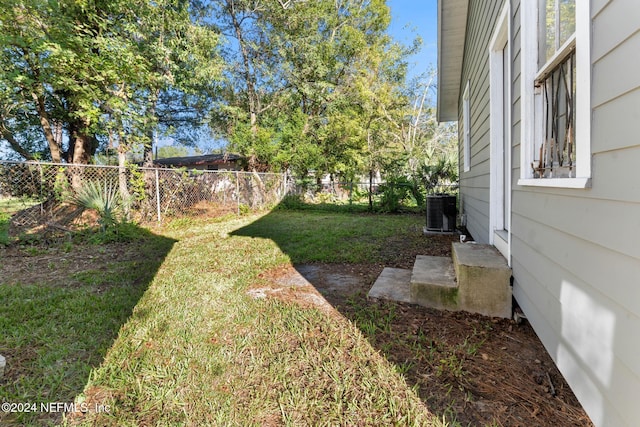 view of yard featuring central AC