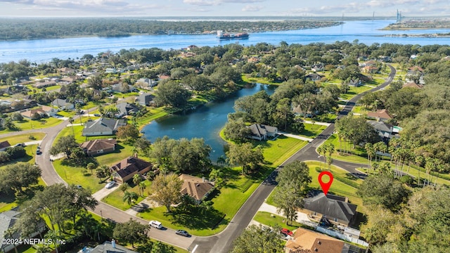 drone / aerial view with a water view