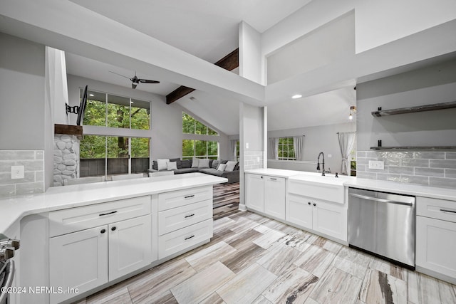 kitchen featuring backsplash, white cabinetry, and dishwasher