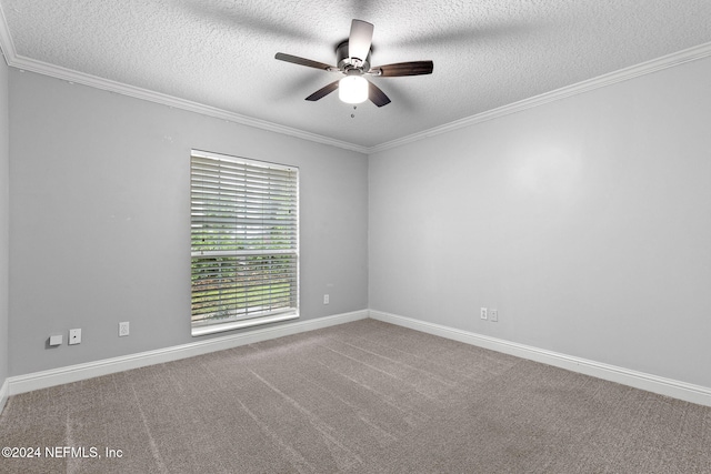 carpeted spare room featuring a textured ceiling, ceiling fan, and ornamental molding