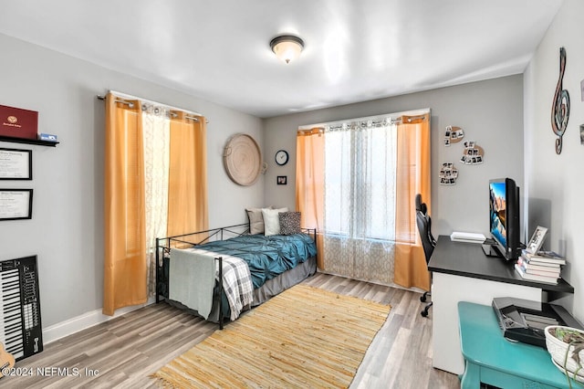 bedroom featuring hardwood / wood-style floors