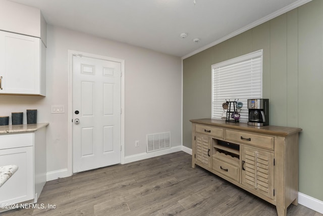 entrance foyer with hardwood / wood-style floors